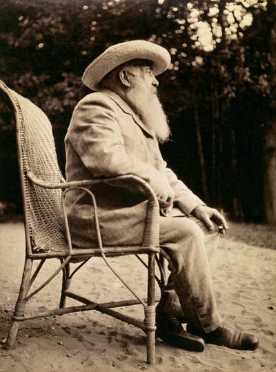 Claude Monet in the garden of Giverny, 1915 by French Photographer